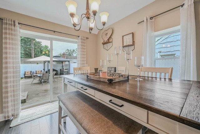 66 Eimer St, Patchogue, NY 11772 - dining room with a chandelier and wood finished floors