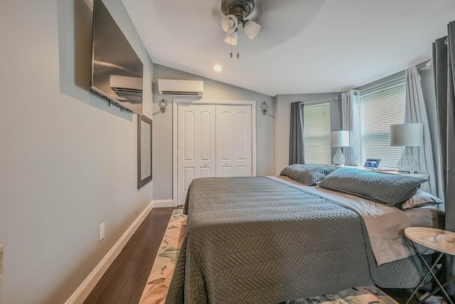 66 Eimer St, Patchogue, NY 11772 - bedroom featuring wood finished floors, a wall mounted AC, a closet, ceiling fan, and vaulted ceiling