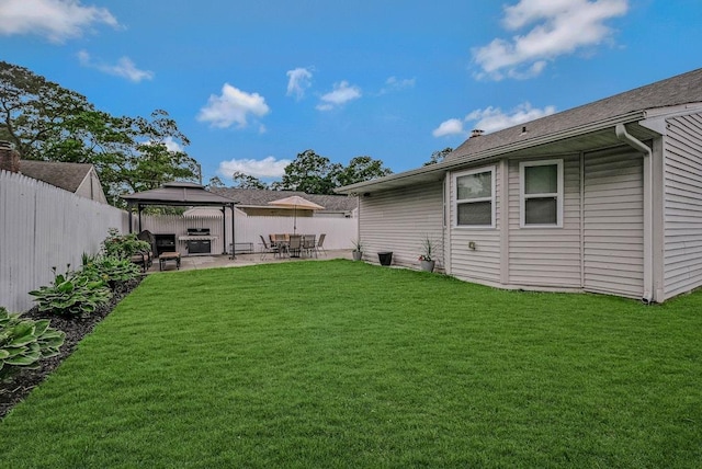 66 Eimer St, Patchogue, NY 11772 - fenced backyard featuring a gazebo and a patio