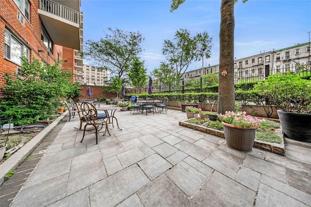 5230 39th Dr Unit 7M, Woodside, NY 11377 - view of patio featuring outdoor dining area