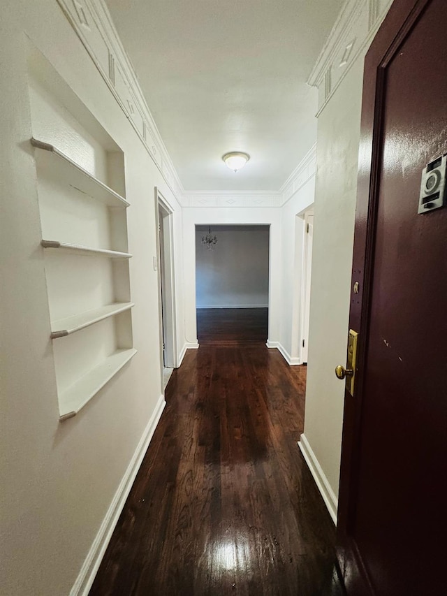 77-04 141st St Unit 67F, Flushing, NY 11367 - hall with wood finished floors, built in shelves, and ornamental molding
