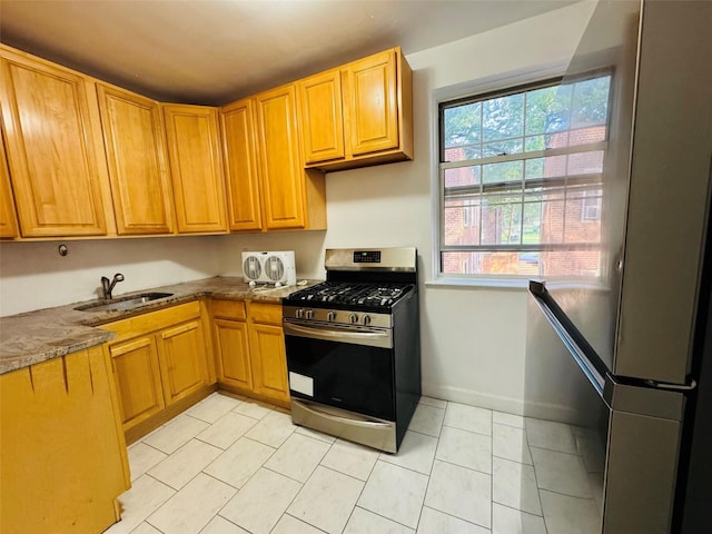 77-04 141st St Unit 67F, Flushing, NY 11367 - kitchen featuring stainless steel appliances and light tile patterned floors