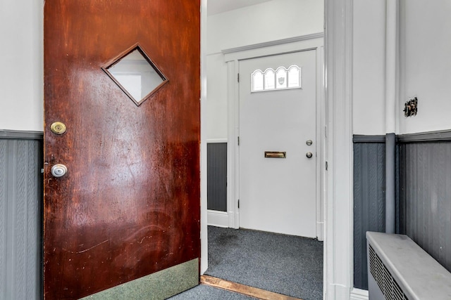 13-19 126th St, College Point, NY 11356 - carpeted foyer with a wainscoted wall