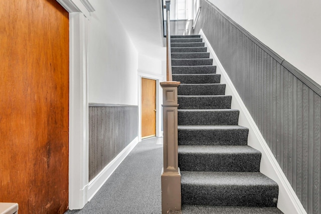 13-19 126th St, College Point, NY 11356 - staircase featuring carpet flooring and wainscoting