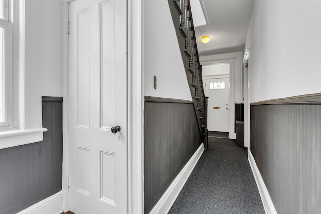 13-19 126th St, College Point, NY 11356 - corridor with wainscoting, dark carpet, and stairs