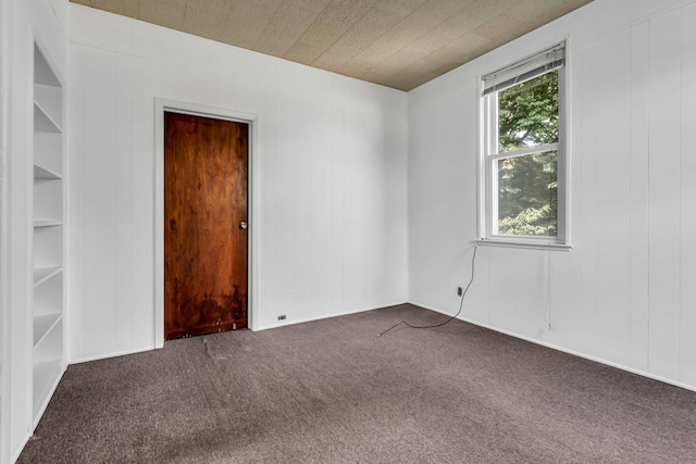 13-19 126th St, College Point, NY 11356 - empty room featuring dark carpet