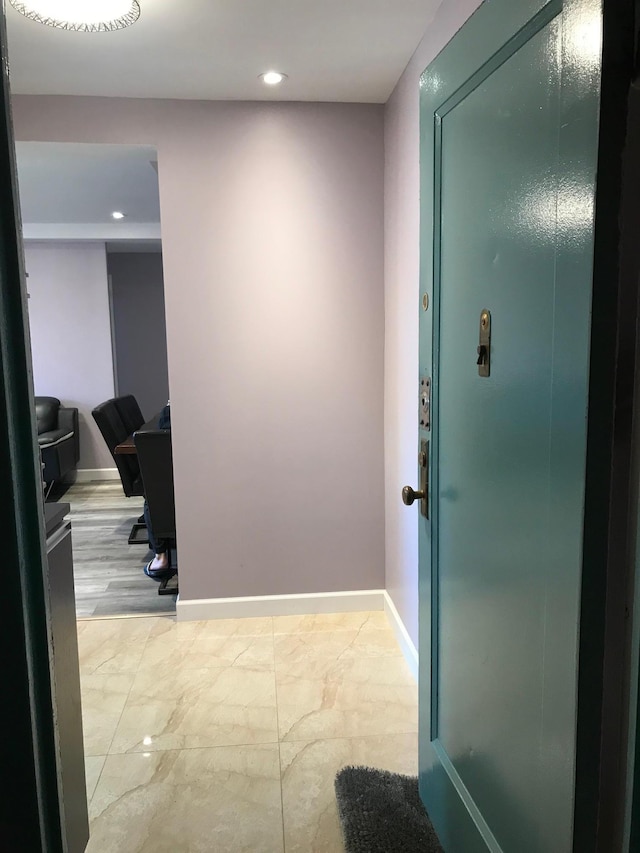 1935 Mcgraw Ave Unit 7C, Bronx, NY 10462 - hallway featuring recessed lighting and marble look tiles