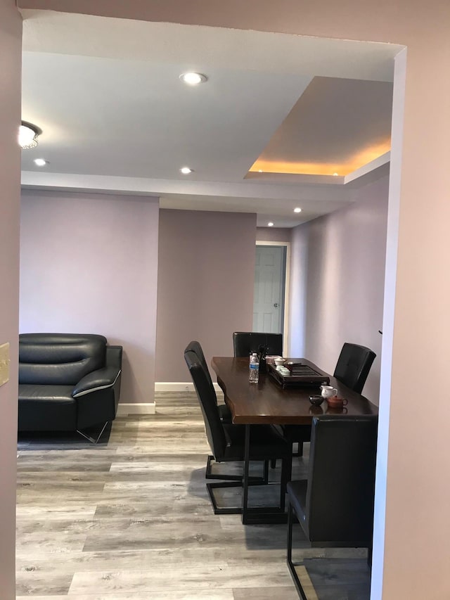 1935 Mcgraw Ave Unit 7C, Bronx, NY 10462 - dining space featuring light wood-style flooring, recessed lighting, and a tray ceiling