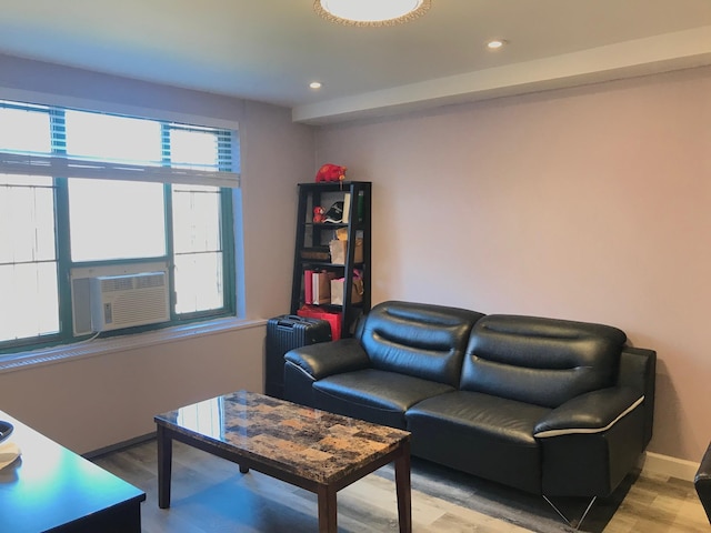 1935 Mcgraw Ave Unit 7C, Bronx, NY 10462 - living area with cooling unit, light wood-style flooring, and recessed lighting