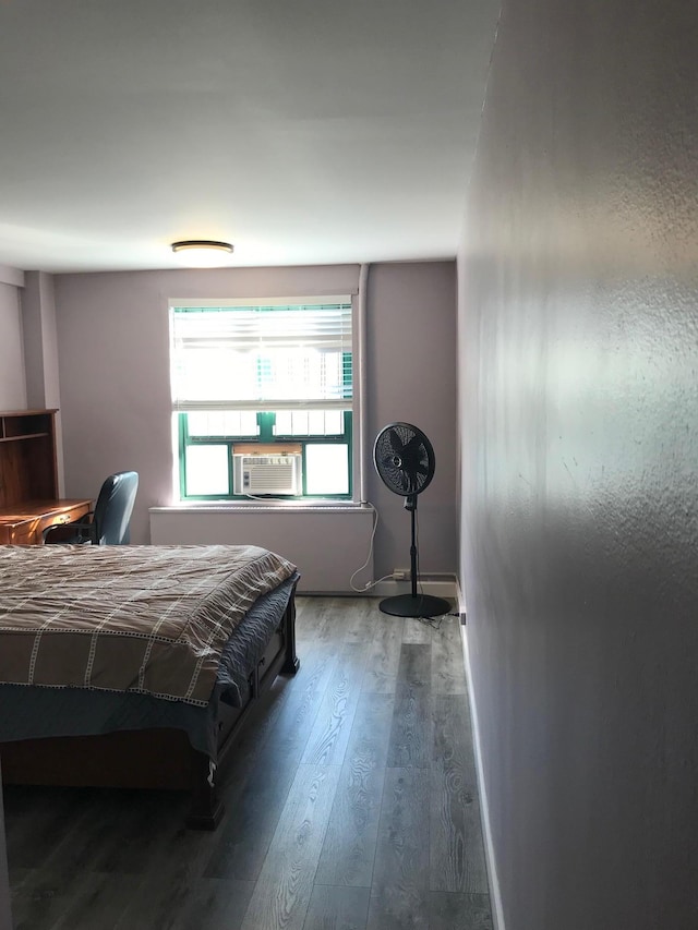 1935 Mcgraw Ave Unit 7C, Bronx, NY 10462 - bedroom featuring cooling unit and wood finished floors