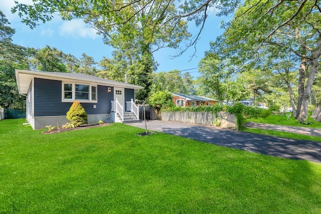 111A Wood Ave, Mastic, NY 11950 - view of front of home featuring asphalt driveway