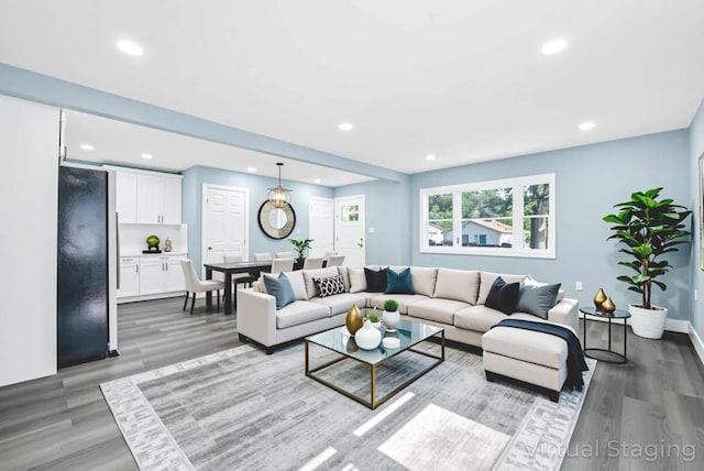 111A Wood Ave, Mastic, NY 11950 - living room with wood finished floors and recessed lighting