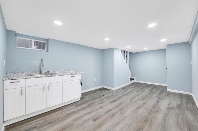 111A Wood Ave, Mastic, NY 11950 - bar area with light wood-style flooring, stairs, and recessed lighting