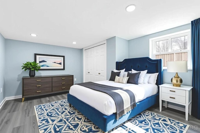 111A Wood Ave, Mastic, NY 11950 - bedroom with wood finished floors, a closet, and recessed lighting