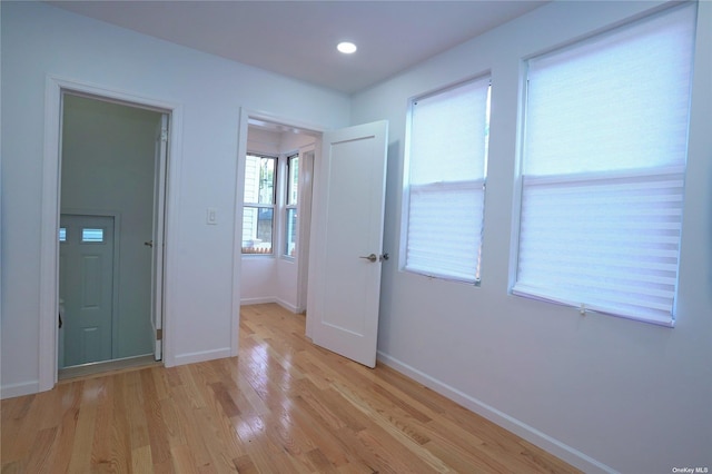 87-44 89th St, Woodhaven, NY 11421 - unfurnished bedroom featuring light wood-style flooring and recessed lighting