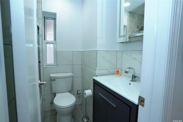 87-44 89th St, Woodhaven, NY 11421 - bathroom featuring tile walls, vanity, tile patterned floors, and a wainscoted wall