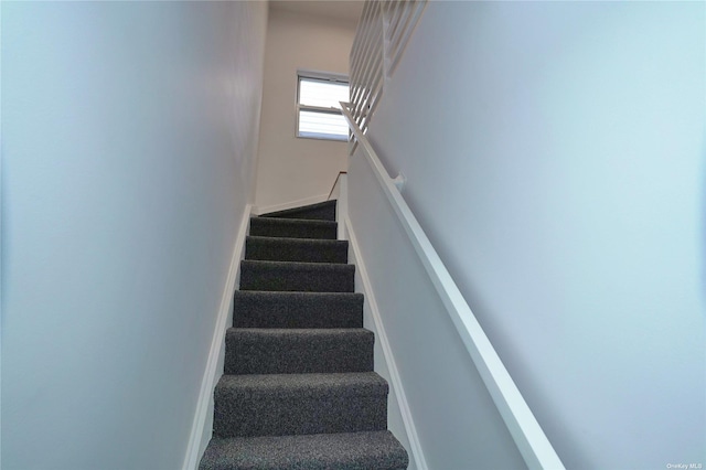 87-44 89th St, Woodhaven, NY 11421 - staircase featuring baseboards