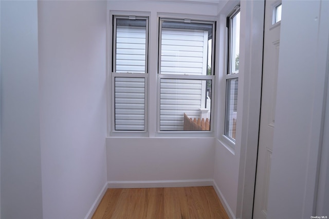 87-44 89th St, Woodhaven, NY 11421 - empty room with wood finished floors and baseboards