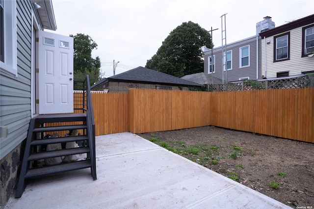 87-44 89th St, Woodhaven, NY 11421 - fenced backyard with a patio