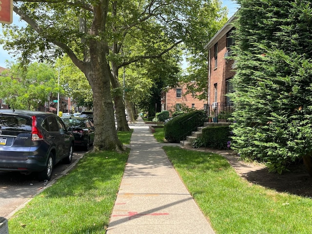 191-09 39th Ave Unit 164, Flushing, NY 11358 - view of asphalt road featuring sidewalks