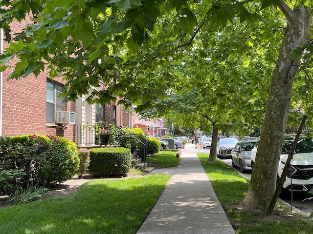 191-09 39th Ave Unit 164, Flushing, NY 11358 - surrounding community with a yard