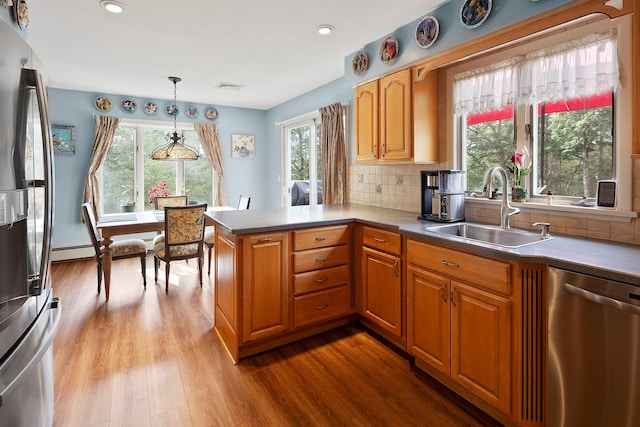 16 Mountain View Dr, Holmes, NY 12531 - kitchen featuring appliances with stainless steel finishes, healthy amount of natural light, wood finished floors, and recessed lighting