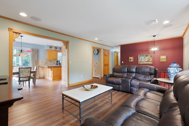 16 Mountain View Dr, Holmes, NY 12531 - living room with ornamental molding, light wood-style floors, baseboard heating, and recessed lighting