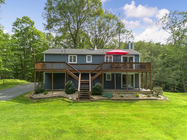 16 Mountain View Dr, Holmes, NY 12531 - rear view of property featuring a deck, stairs, a yard, and a chimney