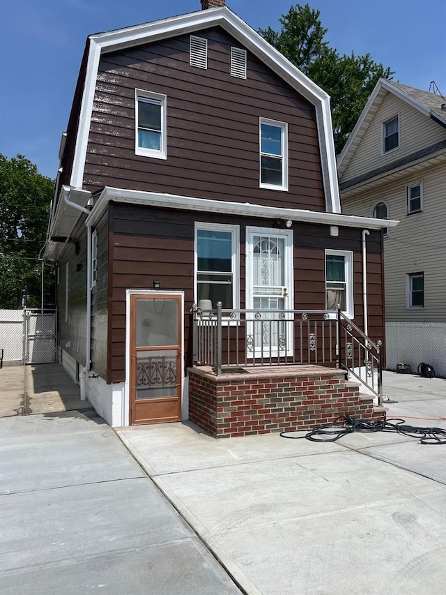 9414 125th St, Richmond Hill, NY 11419 - dutch colonial featuring a gambrel roof