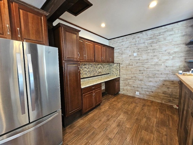 143 N Summit Ave, Patchogue, NY 11772 - kitchen featuring freestanding refrigerator, built in study area, dark wood-style flooring, recessed lighting, and ornamental molding
