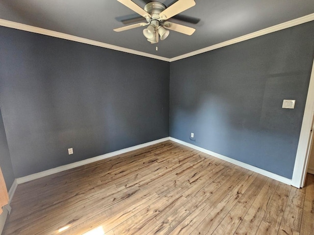 143 N Summit Ave, Patchogue, NY 11772 - unfurnished room with hardwood / wood-style flooring, a ceiling fan, and crown molding