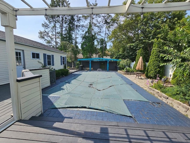 143 N Summit Ave, Patchogue, NY 11772 - view of swimming pool with a covered pool and a wooden deck