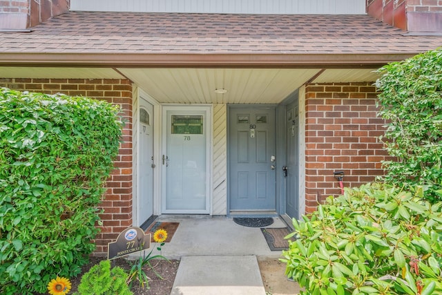 80 Pointe Cir S Unit 80, Coram, NY 11727 - entrance to property with brick siding and a shingled roof