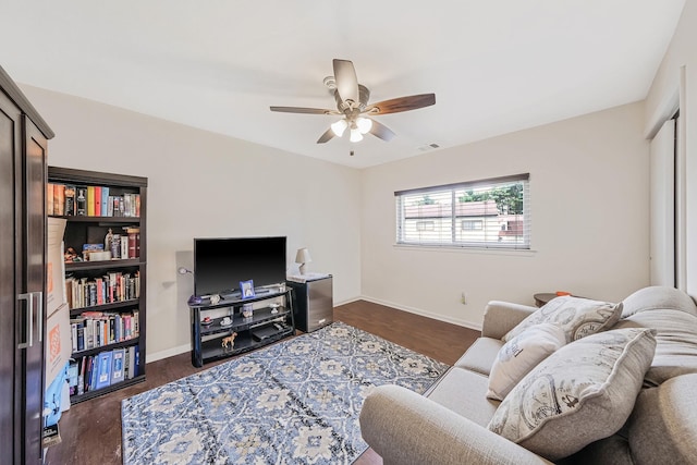 80 Pointe Cir S Unit 80, Coram, NY 11727 - living area featuring ceiling fan and dark wood-type flooring