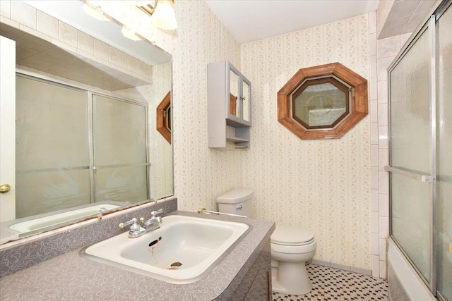 42 N Coleman Rd, Centereach, NY 11720 - bathroom with vanity, enclosed tub / shower combo, tile patterned flooring, and wallpapered walls