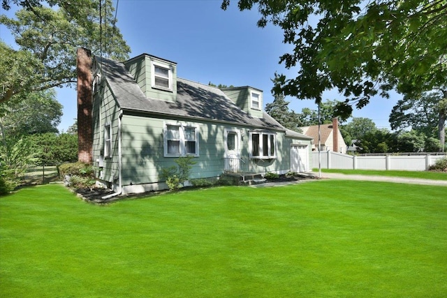 42 N Coleman Rd, Centereach, NY 11720 - new england style home with a chimney, a garage, and driveway