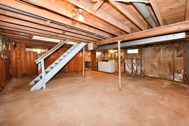 42 N Coleman Rd, Centereach, NY 11720 - basement featuring washing machine and dryer and stairs
