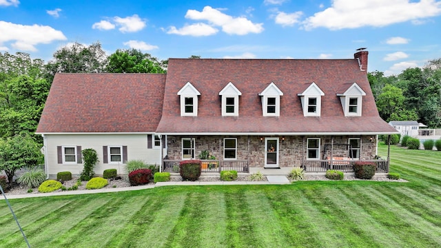 331 Ridge Rd, Campbell Hall, NY 10916 - cape cod home featuring a porch, stone siding, and a chimney