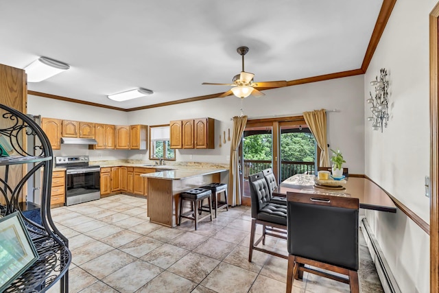 331 Ridge Rd, Campbell Hall, NY 10916 - kitchen featuring electric range, a peninsula, under cabinet range hood, crown molding, and baseboard heating