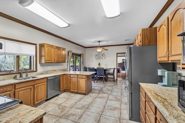 331 Ridge Rd, Campbell Hall, NY 10916 - kitchen featuring stainless steel appliances, a peninsula, healthy amount of natural light, ceiling fan, and crown molding