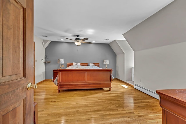 331 Ridge Rd, Campbell Hall, NY 10916 - bedroom featuring a baseboard heating unit, light wood-style floors, recessed lighting, vaulted ceiling, and a ceiling fan