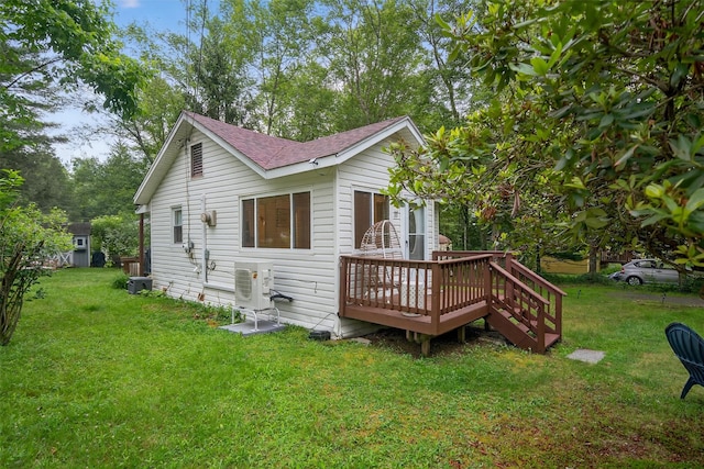 11 Apache Ln, Ferndale, NY 12734 - rear view of property with a wooden deck, roof with shingles, and a yard