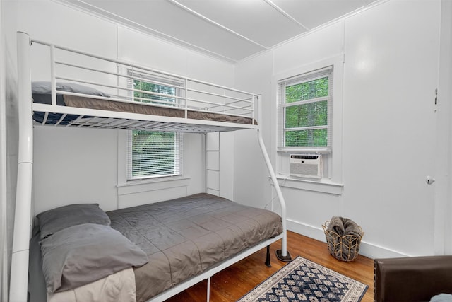 11 Apache Ln, Ferndale, NY 12734 - bedroom with wood finished floors and cooling unit