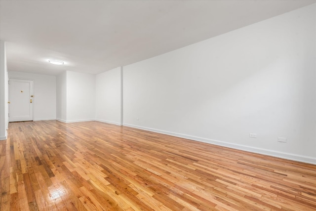 67-30 Clyde St Unit 3L, Forest Hills, NY 11375 - empty room featuring light wood-style floors and baseboards
