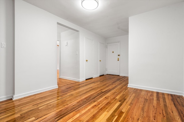 67-30 Clyde St Unit 3L, Forest Hills, NY 11375 - spare room featuring light wood finished floors and baseboards