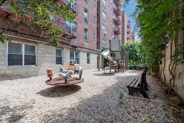 67-30 Clyde St Unit 3L, Forest Hills, NY 11375 - surrounding community featuring a playground