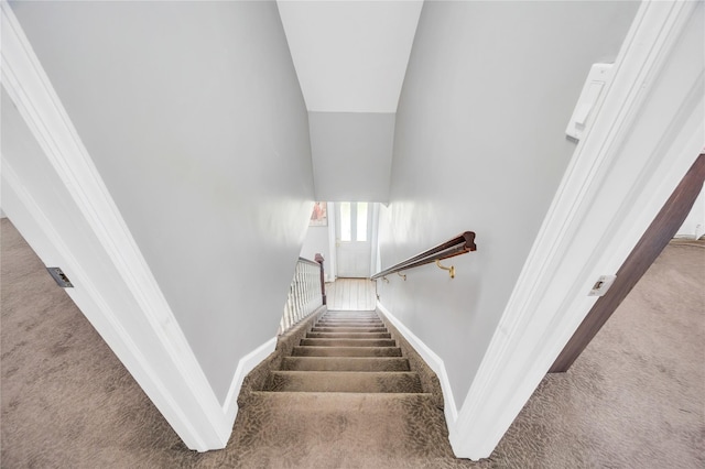 45 Potter Ln, Levittown, NY 11756 - stairway featuring carpet and lofted ceiling