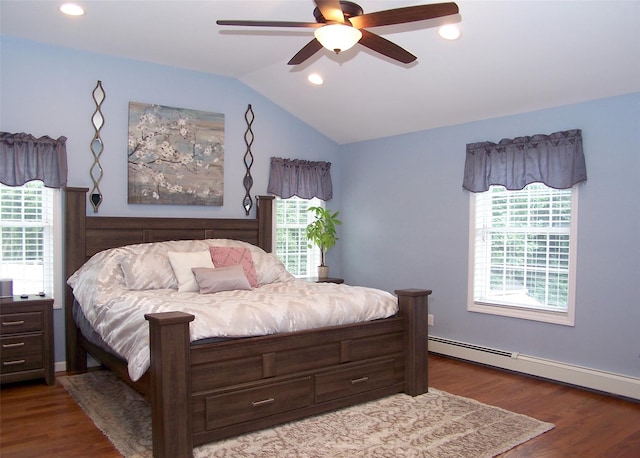 8 Mannes St, Ronkonkoma, NY 11779 - bedroom featuring a baseboard heating unit, vaulted ceiling, multiple windows, wood finished floors, and recessed lighting