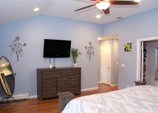 8 Mannes St, Ronkonkoma, NY 11779 - bedroom featuring dark wood-type flooring, baseboard heating, a ceiling fan, recessed lighting, and vaulted ceiling