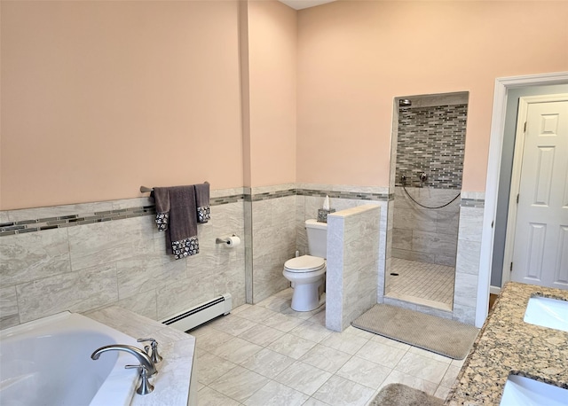 8 Mannes St, Ronkonkoma, NY 11779 - bathroom with a baseboard radiator, a tile shower, a bath, tile walls, and wainscoting